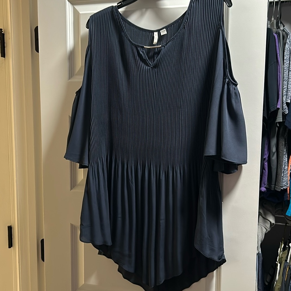 Navy blue cold shoulder blouse with unique cut at bottom